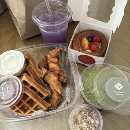 Chicken and waffles, Strawberry Matcha Chia Pudding, supreme croissant, butterfly pea tea lemonade