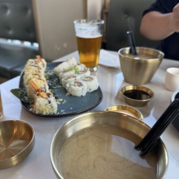 Sushi Taisho - Shrimp Crunchy Roll - left of plate Spicy Tuna Hand Roll - right of plate - Sushi Bars Near Me - Carlsbad, California Sushi Taisho - Shrimp Crunchy Roll - left of plate Spicy Tuna Hand Roll - right of plate - Sushi Bars Near Me - Carlsbad, California