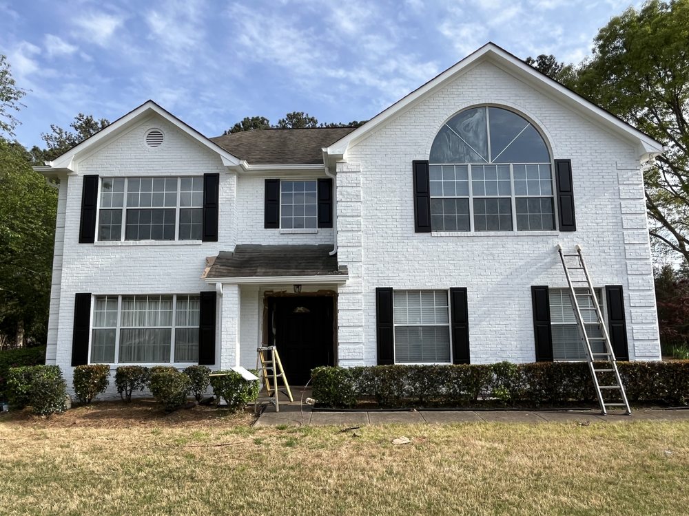 Slide of Rescue Roofing & Exteriors