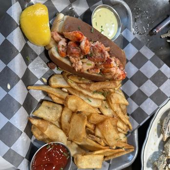 Salty Mary's - Lobster Roll poached in butter. Delicious! - Seafood Near Me - Westlake, Ohio Salty Mary's - Lobster Roll poached in butter. Delicious! - Seafood Near Me - Westlake, Ohio