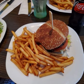 Hochelaga - a burger and french fries on a plate - Pizza Near Me - Montreal, Quebec Hochelaga - a burger and french fries on a plate - Pizza Near Me - Montreal, Quebec