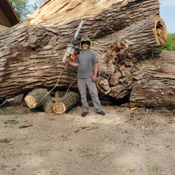 BARC Tree Care - This was a large cottonwood tree that broke in a storm causing massive damage. We were called in to safely remove the remaining portion.