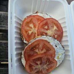 Cream cheese and tomato everything bagel