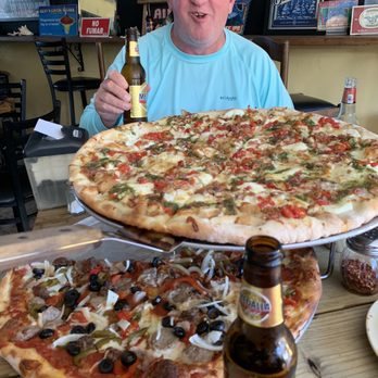Revolution Pizza Shop - The Pizza That Cannot Be Named (daily special the owner threw together for us) and a custom Supreme. - Pizza Near Me - Luquillo Beach, Puerto Rico Revolution Pizza Shop - The Pizza That Cannot Be Named (daily special the owner threw together for us) and a custom Supreme. - Pizza Near Me - Luquillo Beach, Puerto Rico