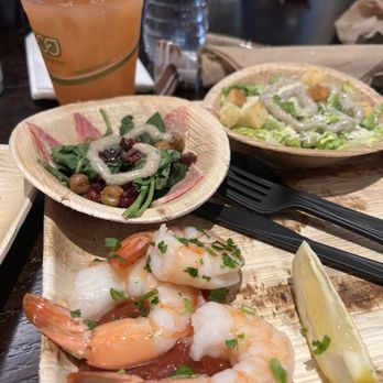 Truist Club - Two types of salad Caesar and spinach salad with fried garbanzo beans and dried cranberries. Jumbo shrimp cocktail and a sangria cocktail. - Lounges Near Me - Atlanta, Georgia