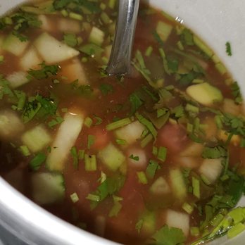 Taqueria Sonoma - a bowl of soup with a spoon in it - Mexican Near Me - Sonoma, California Taqueria Sonoma - a bowl of soup with a spoon in it - Mexican Near Me - Sonoma, California