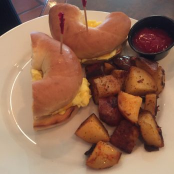 Michael's Grill - Egg and bagel with potatoes - Seafood Near Me - Tampa, Florida Michael's Grill - Egg and bagel with potatoes - Seafood Near Me - Tampa, Florida