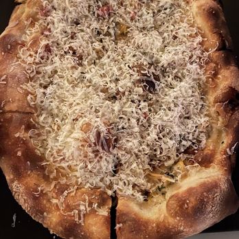 Serious Pie Downtown - Penn Cove clam pizza: super-thin cracker-like crust, not a lot of clams or pancetta, and a whole lot of cheese - Pizza Near Me - Seattle, Washington