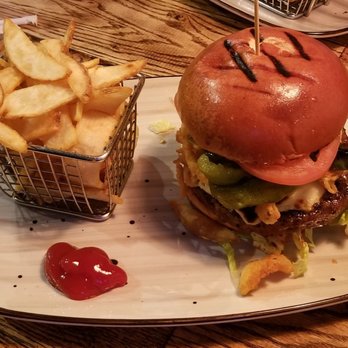 Bonfire Grille - All American Burger that comes with a neat basket handcut fries. - New American Near Me - Milford, Connecticut