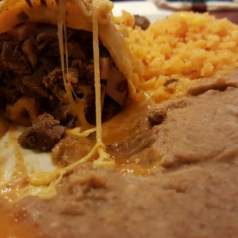 Rita's Mexican Restaurant - Burrito Texano...massive!! Stuffed with 3 meats ancheesed smothered with . - Mexican Near Me - Rosenberg, Texas
