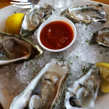 Land's End Resort - Oysters on a half shell. So sweet, fresh and just the right brine taste. - Hotels Near Me - Homer, Alaska Land's End Resort - Oysters on a half shell. So sweet, fresh and just the right brine taste. - Hotels Near Me - Homer, Alaska