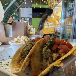Bar plus Kitchen STT - ISLAND TACOS curry stewed chicken, OR picadilla ground beef, spinach chop chop chutney, tomato relish, swiss, seasoned tortillas.
