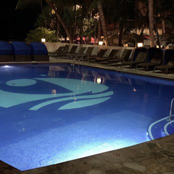 Outrigger Waikiki Beach Resort - Swimming pool at night - Resorts Near Me - Honolulu, Hawaii