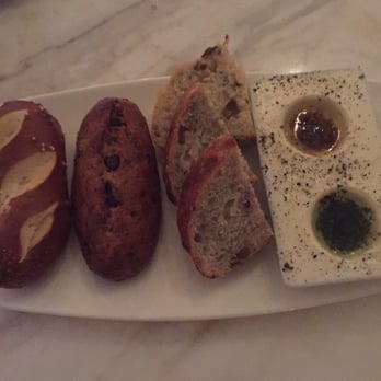 Vintner Grill - Bread & olive oil with spices - New American Near Me - Las Vegas, Nevada Vintner Grill - Bread & olive oil with spices - New American Near Me - Las Vegas, Nevada