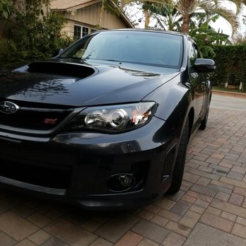 Detail Garage - San Fernando Valley - Car has been washed with Maxi Suds II  using a foam canon. Car hasnt been clay bar or wax in over 1 year - Auto Detailing Near Me - Canoga Park, California
