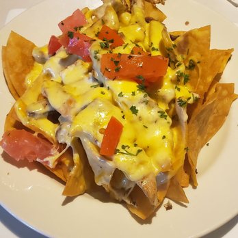 Rick's Restaurant - Nachos (8.99) with chicken (extra 5.00). Definitely not worth 13.99! - Cuban Near Me - Palm Springs, California Rick's Restaurant - Nachos (8.99) with chicken (extra 5.00). Definitely not worth 13.99! - Cuban Near Me - Palm Springs, California