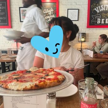 Juliana's - Our sweet waiter in the background - Pizza Near Me - Brooklyn, New York Juliana's - Our sweet waiter in the background - Pizza Near Me - Brooklyn, New York