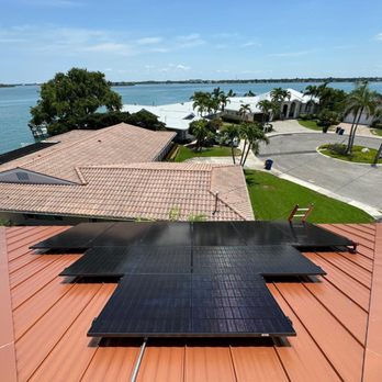 Team Armored Roofing - Standing Seam Metal Roof with Copper Penny Finish & Solar! - Roofing Near Me - Palm Harbor, Florida Team Armored Roofing - Standing Seam Metal Roof with Copper Penny Finish & Solar! - Roofing Near Me - Palm Harbor, Florida