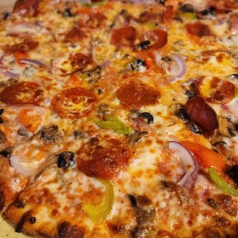 Yaghi's Pizzeria - "The Works" $23.99 (we held the hamburger and green olives) - Pizza Near Me - San Antonio, Texas Yaghi's Pizzeria - "The Works" $23.99 (we held the hamburger and green olives) - Pizza Near Me - San Antonio, Texas
