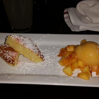 The Pullman - Olive oil pound cake with peach bourbon sorbet and peaches - New American Near Me - Glenwood Springs, Colorado