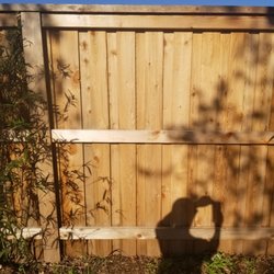 Firehouse Fence & Deck Stain - Before non stained  board  on board cap and trim