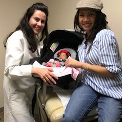 Pantea Mozayeni - Taken with Dr. Mozayeni and our daughter Brynne Marie, 2 weeks after our successful planned C-section.
