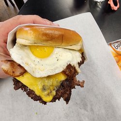 Cal's Fried Chicken & Burgers - My cousin ordered a Single Smashed Cheeseburger with egg and bacon! Still thinking about that egg yolk!