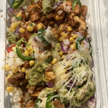 Bubbakoo's Burritos - Jamaican jerk grill chicken bowl with corn salsa, hot salsa, onions, fresh jalapeños and cheese. - New Mexican Cuisine Near Me - Zephyrhills, Florida