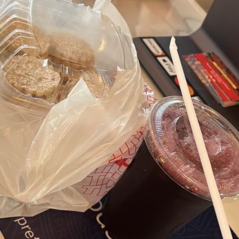 Inka Brasas - a bag of cookies and a drink - Peruvian Near Me - Spring, Texas Inka Brasas - a bag of cookies and a drink - Peruvian Near Me - Spring, Texas
