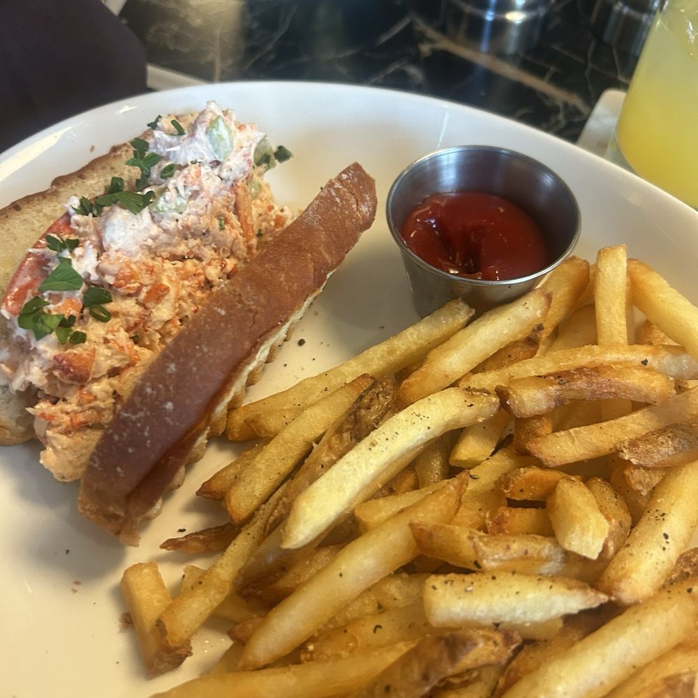Lobster Roll and fresh cut French Fries Lobster Roll and fresh cut French Fries