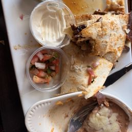 Quesadilla was floating in Grease. It got soggy Quesadilla was floating in Grease. It got soggy