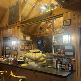 a kitchen with a counter and bar
