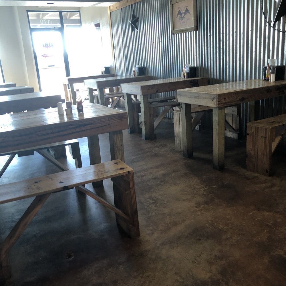 Potato Shack Plus - A side room with tables and benches. - Caterers Near Me - College Station, Texas Potato Shack Plus - A side room with tables and benches. - Caterers Near Me - College Station, Texas