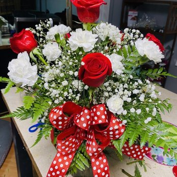 Deb's Garden - I asked for a bouquet in red and white, with six roses, greenery and filler, and ribbon. This looks like a nice, full bouquet. - Florists Near Me - Bossier City, Louisiana Deb's Garden - I asked for a bouquet in red and white, with six roses, greenery and filler, and ribbon. This looks like a nice, full bouquet. - Florists Near Me - Bossier City, Louisiana