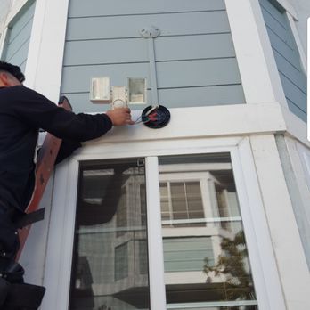 G. E. Shears Electric - Installing a motion detector on a condominium - Electricians Near Me - Pasadena, California G. E. Shears Electric - Installing a motion detector on a condominium - Electricians Near Me - Pasadena, California