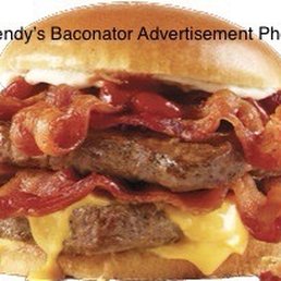 This is what a Baconator is advertised to look like. In the past, it looked like this and had six strips of bacon. This is what a Baconator is advertised to look like. In the past, it looked like this and had six strips of bacon.