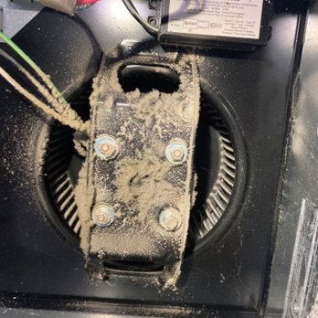 Attic Cleaning Services - Another another ceiling fan (before cleaning) - Insulation Installation Near Me