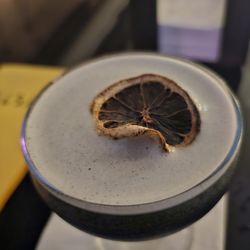 Elsa - Vivian Darkbloom- Union mezcal, lime, pineapple, charcoal, Velvet Falernum, and lime bitters. $15. Outstanding drink. Nice balance