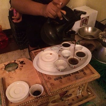 Mesob Ethiopian Restaurant - Coffee ceremony in action! Don't plan to breeze through it, it's a process! - Ethiopian Near Me - Denver, Colorado Mesob Ethiopian Restaurant - Coffee ceremony in action! Don't plan to breeze through it, it's a process! - Ethiopian Near Me - Denver, Colorado