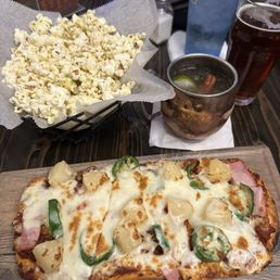 Apple Cider Mule, Hawaiian pizza. And complement popcorn.