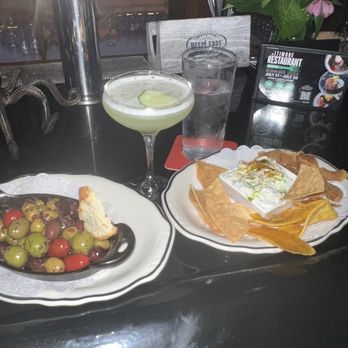 OctoBar - oktini drink, tzatziki tapas dish and warmed olives dish - Tapas/Small Plates Near Me - Baltimore, Maryland OctoBar - oktini drink, tzatziki tapas dish and warmed olives dish - Tapas/Small Plates Near Me - Baltimore, Maryland