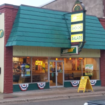 Subway - a restaurant with a green awning and a yellow sign - Sandwiches Near Me - Sault Sainte Marie, Michigan
