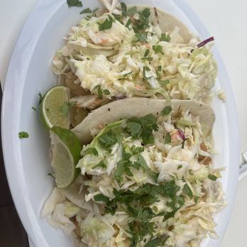 La Cueva Del Mar - Fish Tacos  Made with crunchy fish chunks in a flour tortilla topped with slaw and fresh cilantro. Choose spicy mayo or chipotle mayo. - Puerto Rican Near Me - Fajardo, Puerto Rico