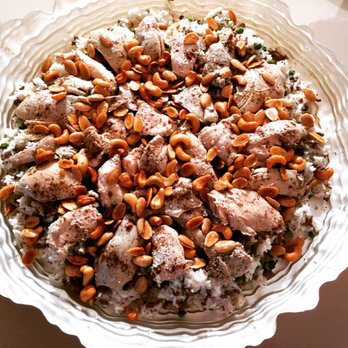 Honeydoe - Our amazing Ouzi! One of the most traditional dish in Syria. Rice, peas, corn, beef, grilled chicken and cashews on top! - Caterers Near Me - Chicago, Illinois