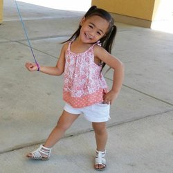 Kids Care Dental & Orthodontics - Natomas - Lillie showing off her clean smile