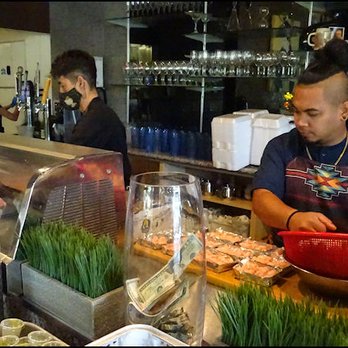 Tang's Sushi - Behind the sushi bar, there were two talented and friendly sushi chefs making delicious sushi.  These guys certainly know what their doing! - Sushi Bars Near Me - Roseville, California