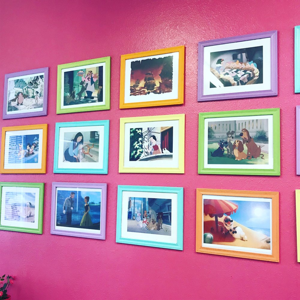 Cups and Cones - a pink wall with colorful frames - Coffee & Tea Near Me - Avon, North Carolina Cups and Cones - a pink wall with colorful frames - Coffee & Tea Near Me - Avon, North Carolina