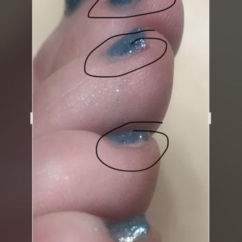 Chic Nails - Voids in polish where the nail polish DOESNT meet the end of the nail.   And she left new nail polish on my skin! - Nail Salons Near Me - Medford, Oregon