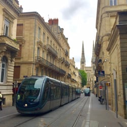 Rue Vital Carles - Tram passing through the street (that gets packed with pedestrians whenever the tram passes which is every4-5 min).