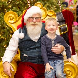 Miracle At Big Rock - A special visit with Santa in his chair in the barn at Miracle at Big Rock.